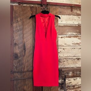 NWOT! Red dress with choker v neck, cut out back & unique slits! Small